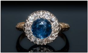 18ct Gold Sapphire And Diamond Cluster Ring Central Sapphire Surrounded By 14 Cushion Cut Diamonds,