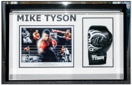Signed and Mounted in a Framed 3D Case Mike Tyson Glove and Photograph. Comes with a Certificate of