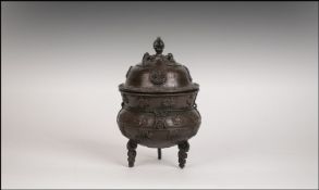 Chinese Bronze Lidded Koro With Applied Decoration. Raised on Tripod Base. 7.5`` in height.