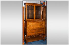 An Unusual Oak Edwardian Fall Down Front Secretaire Bookcase. With fitted interior below two long