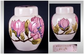 Moorcroft Large lidded Ginger Jar, `Coral Hibiscus` Pattern on cream ground. 8.25`` in height.