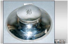 A Silver Desk Capstan Hinged Cover, Hallmark London 1919. Makers mark CB & S. 5`` in diameter.