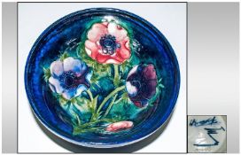 W. Moorcroft Signed Footed Bowl `Clematis` Design On Blue Ground. 2.75`` in height, 6.5`` in