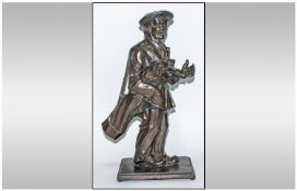 A Vintage Bronzed Unusual Cast Metal Figural Fire Guard Stand, In the form of a golfer carrying his