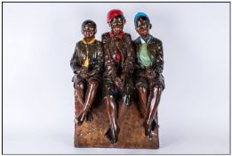 Large Chalk Figure Group Of Three Black Children sitting cross legged on a seat. 22`` in height,
