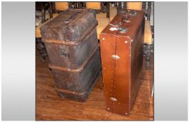 A Large Vintage Brown Leather Travelling Trunk with a fitted interior made by Garstin of London.