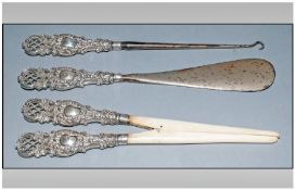 Victorian Embossed Silver Handled 3 Piece Gentlemans Dressing Room Aids Set comprising 1. Silver &