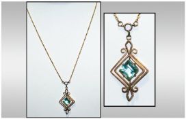 Victorian 9ct Gold & Aquamarine Pendant fitted to a 9ct gold integral chain. Marked 9ct. 14" in