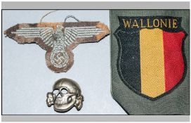 WW2 German SS Arm Eagle Camouflage and SS Skull and Wallomie Armshield.