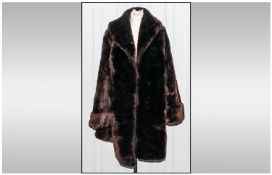 Three Quarter Length Beaver Lamb Coat. Fully lined. Hook & Loop fastening. Cuff Sleeves.