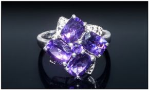 Deep Purple Amethyst Cluster Ring, four cushion cut rich purple amethysts around a small round cut,