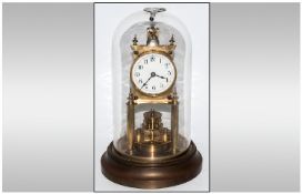Gustan Becker Rare 400 Day Anniversary Clock Circa 1900. Raised on a circular stepped wooden base.