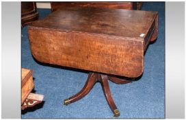 Regency Mahogany Drop Leaf Break Table with one drawer on 4 splayed legs. Terminating on brass