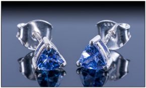 Tanzanite Trillion Cut Stud Earrings with post and push back fittings; .6ct of the tanzanite, known