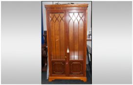 A Modern Veneered Teak Display Cabinet with glazed doors and central opening. Two internal glass