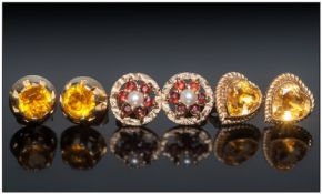 Three Pairs Of 9ct Gold Gem Set Stud Earrings Mounted With Citrine, Ruby And Pearl Coloured Stones,