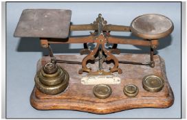 Brass Postal Scales On Wooden Plinth, with weights.
