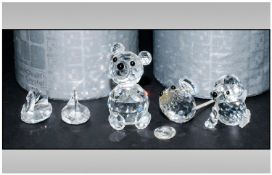 Swarovski Crystal Figures, 4 in total. 1. Dog, 2. Bear, 3. Mouse, 4. 2 Swans. Various Sizes. Boxed.