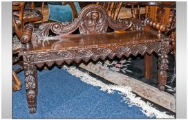 Late 19th Century Flemish Carved Oak Window Seat unusual turned bobbin arms, shaped carved back. On