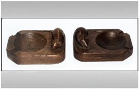 Robert Thompson Two Hand Carved Mouseman Ashtrays, circa 1960`s. One in light oak. The other in