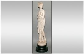 A 1960`s High Quality Resin Figure Of Venus In Classical Pose raised on a black wooden base. Stands