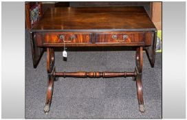 Mahogany Sofa Table standing on 4 cabriole legs with cross stretchers. 2 drawers to front of