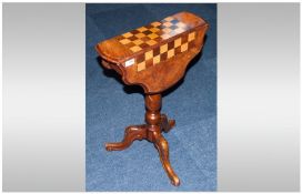 Victorian Walnut Games Table with inlaid chess board. Top swivel action with shaped moulded edge