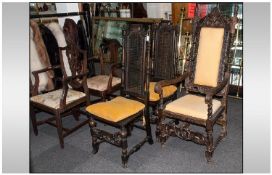 Three Oak Chairs Comprising two large carved oak bishops chairs, profusely carved back & arms on