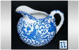 Chinese 19th Century Blue and White Small Jug with Six Character Marks to Base. Height 3.25 Inches.