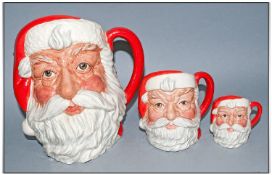 Royal Doulton Character Jugs, Set Of Three `Santa Claus` Large D6704, Medium D6705 & Small D6706.