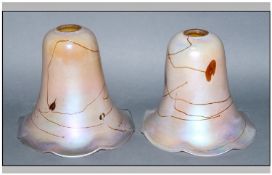 John Ditchfield Early Glassform Pair Of Peach Coloured Iridescent Lamp Shades signed to neck area.