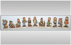 Hummel Figures - A Collection of Eleven Figures, Comprises, Little Hiker, Girl on a Branch,