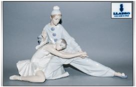 Lladro Figure `Closing Scene` Model number 4935, Issued 1974-1996. 9.5`` in height. Females tip of