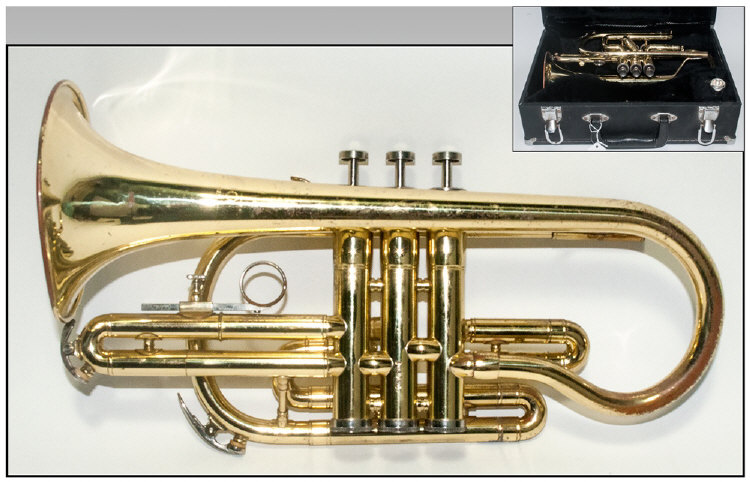 Boosey & Hawkes Brass Cornet, marked B&H 400. With 7C mouth piece In hard case.