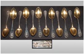 German 19th Century Silver Set Of 12 Teaspoons with gilt bowls. Marked 800 & German silver marks.