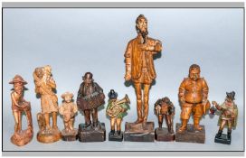 A Collection Of Vintage Carved Wooden Figures, 9 in total. Various sizes, subjects & origins.