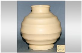 Wedgwood Keith Murray Ofetruria Ribbed Cream Vase marks to base. Stands 6.5`` in height.