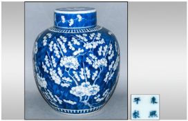 Chinese 19th Century Blue & White Ginger Jar In Unglazed Blue decorated with images of the prunus