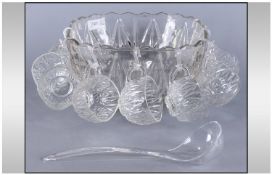 Glass Punch Bowl together with 12 Cups, Ladle and Hooks. (1 Hook Missing) 10.75`` Diameter.