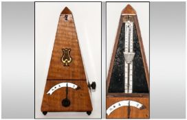 Piano Metronome in a Wooden Case. 9.5 inches high.