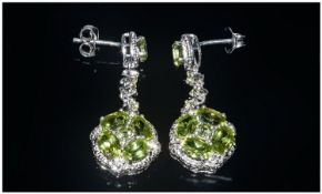 Peridot Cluster Drop Earrings, each cluster drop comprising four large oval cut peridots around a