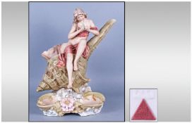 Royal Dux Girl On A Shell Centrepiece the semi naked figure of a young girl playing the lute. Seated