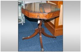 Wooden Octagonal Occasional Table. Tripod Base, Carved Top and Storage Shelf Below. 23" Wide x 26"