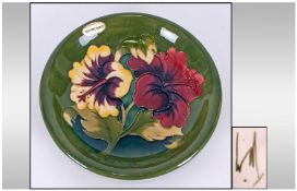 W.Moorcroft Shallow Footed Bowl 'Hibiscus' Design on green ground. Excellent condition. 8.5" in