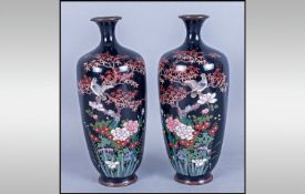 Pair of Cloisonne Ovoid Vases, Meiji period, with detailed polychrome scenes showing a grey and