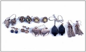 Collection of Eight Pairs of Silver Earrings, 19th/20thC