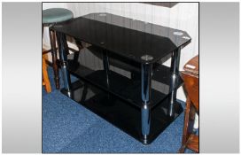High Gloss Black & Chrome TV Stand, two tier. 21" in height, 31" in weight.