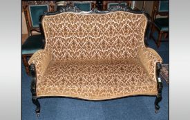 Edwardian Mahogany Ebonised Two Seater Settee, with carved padded back & arms. Covered an embossed