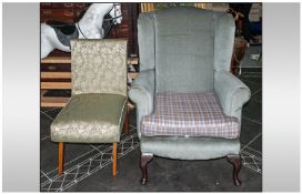 An Upholstered Queen Anne Style Winged Arm Chair, on Cabriole Legs, with a 1950's Upholstered