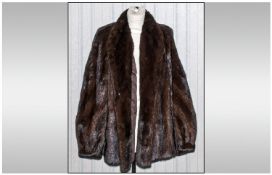 Ladies Ranch Mink Jacket, fully lined with embroidered initials A.J. Slit pockets, hook & loop